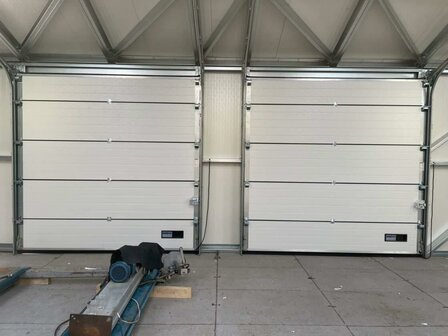 Daklijnvolgende overheaddeur Multi Loods