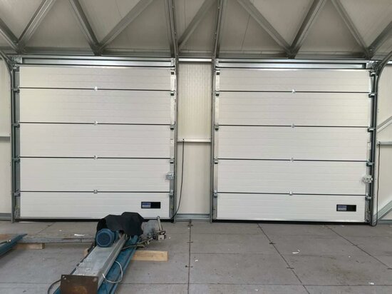 Daklijnvolgende overheaddeur Multi Loods